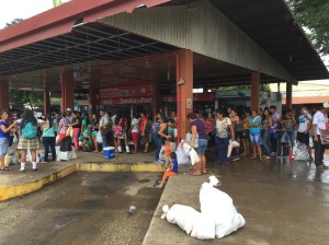 people at bus station
